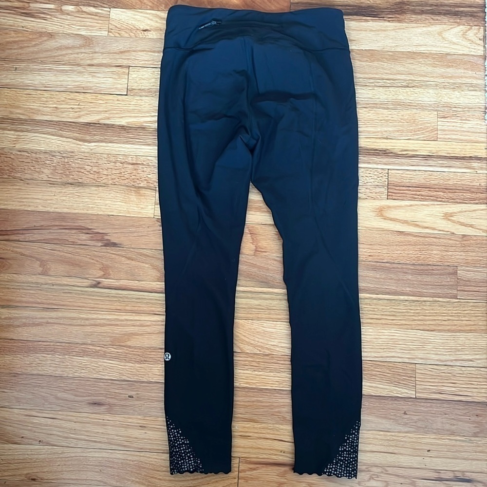 LULULEMON tight stuff reflective scalloped hem size 6